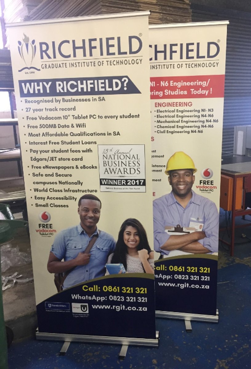 Pull up banners beside a branded table