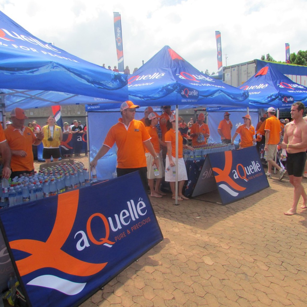 Branded gazebos at a busy outdoor event