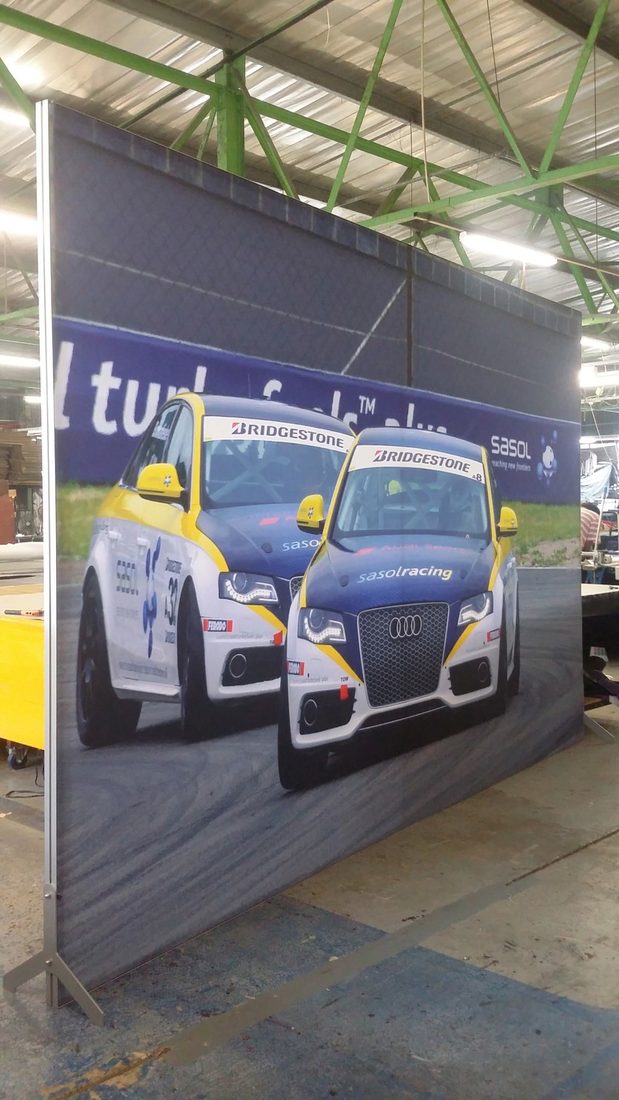 A printed wall on an indoor exhibition stand