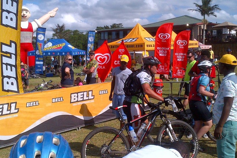 Branded gazebos and banners at a community event