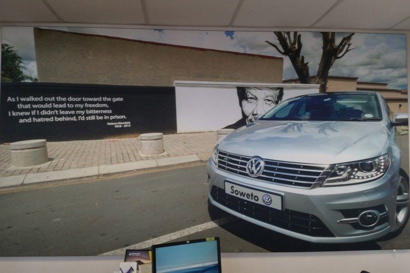 Large printed display wall installed in an indoor showroom